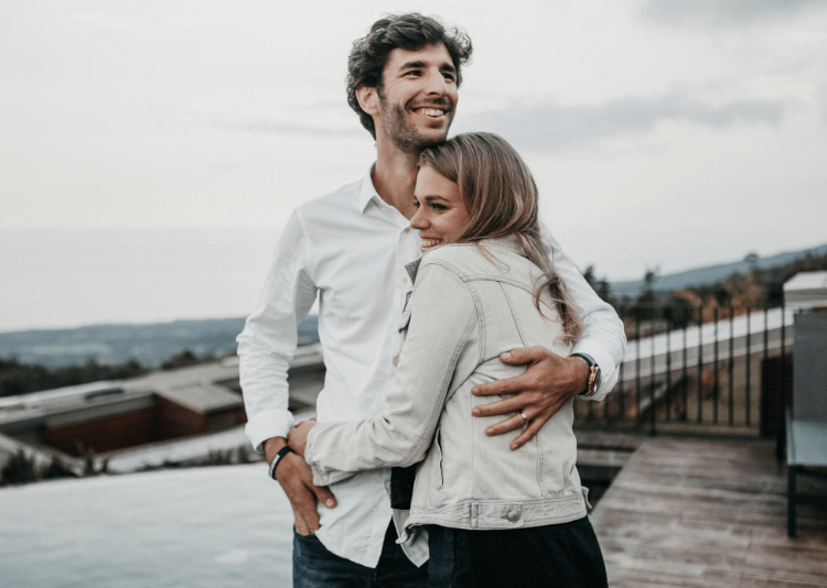 Man and woman hugging each other