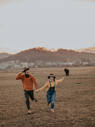 Man holding woman hand