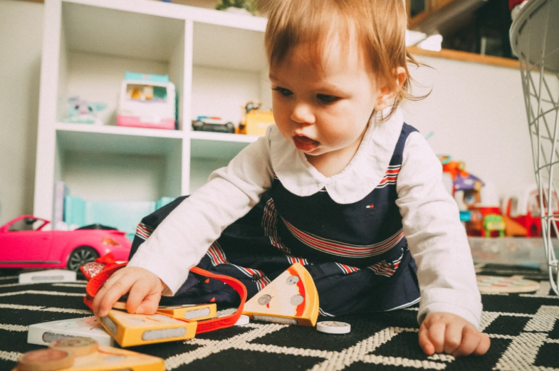 Baby Playing with Toys